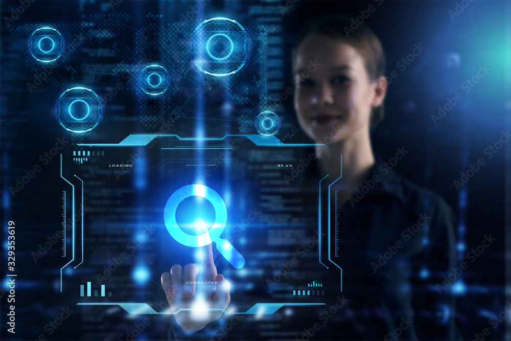 Business, Technology, Internet and network concept. Young businessman working on a virtual screen of the future and sees the inscription: Business, Technology, Internet and network concept. Young businessman working on a virtual screen of the future and sees the inscription: