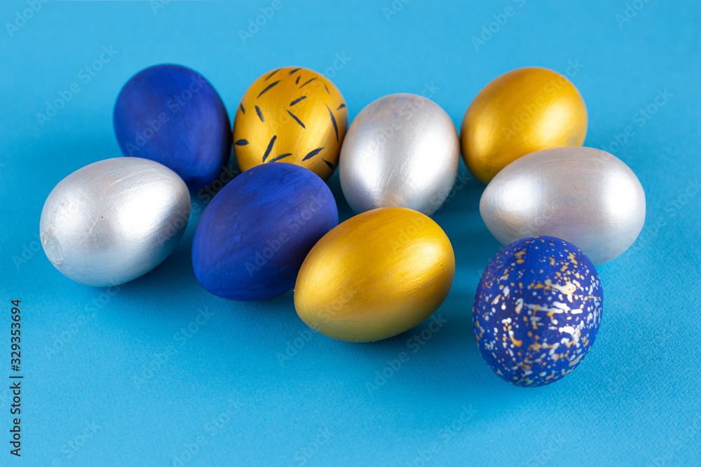 Christ is risen. A large number of eggs painted in various colors on a blue background. Christ is risen. A large number of eggs painted in various colors on a blue background.