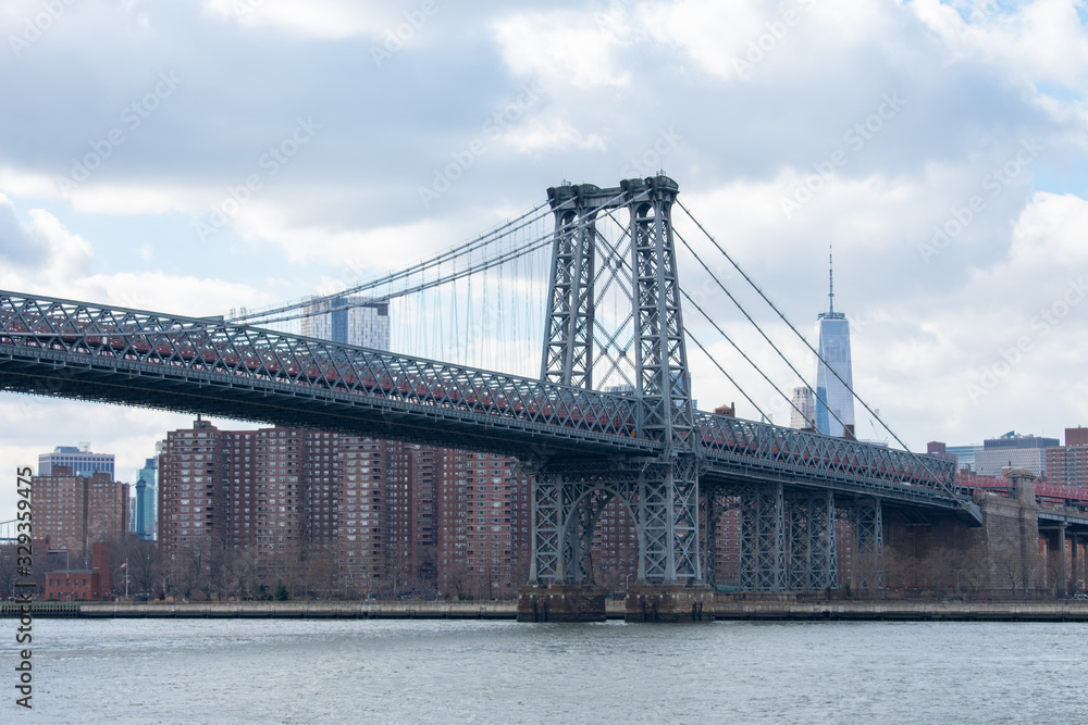 The Williamsburg Bridge over the East River looking towards the Lower East Side of New York City