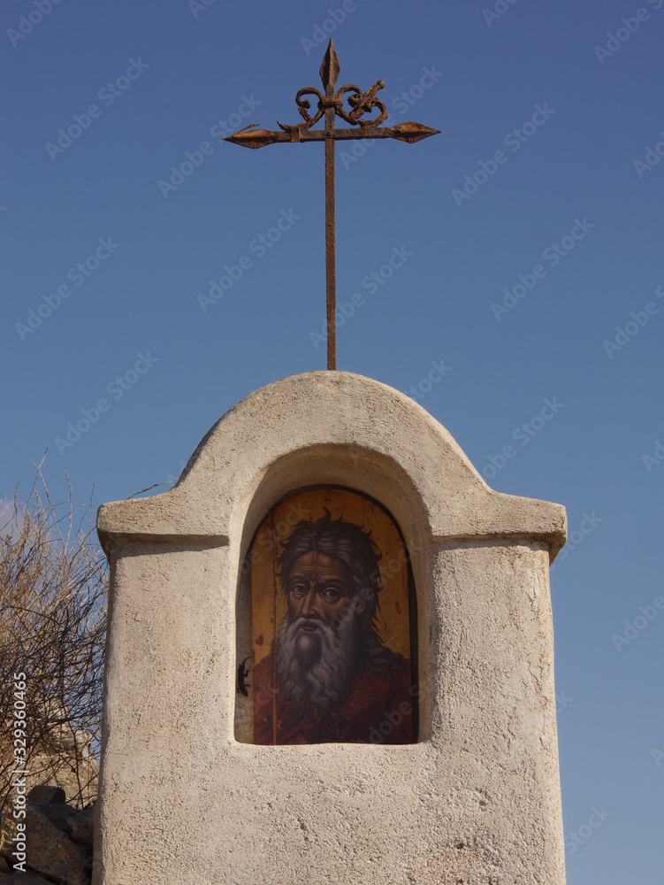 Details of the exteriors and interiors of the Orthodox monastery of the prophet Elijah located on the mountain of the prophet Elijah on the island of Santorini, Greece. Details of the exteriors and interiors of the Orthodox monastery of the prophet Elijah located on the mountain of the prophet Elijah on the island of Santorini, Greece.