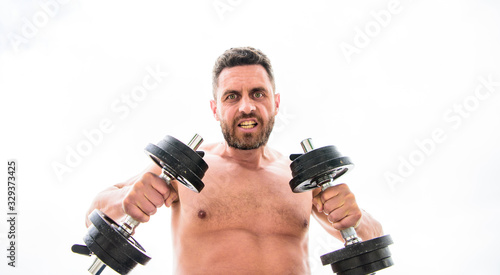 man sportsman with strong ab torso. steroids. athletic body. Dumbbell gym. fitness health diet. Muscular angry man exercising with barbell. sport equipment. Perfect six pack. Sport is our life