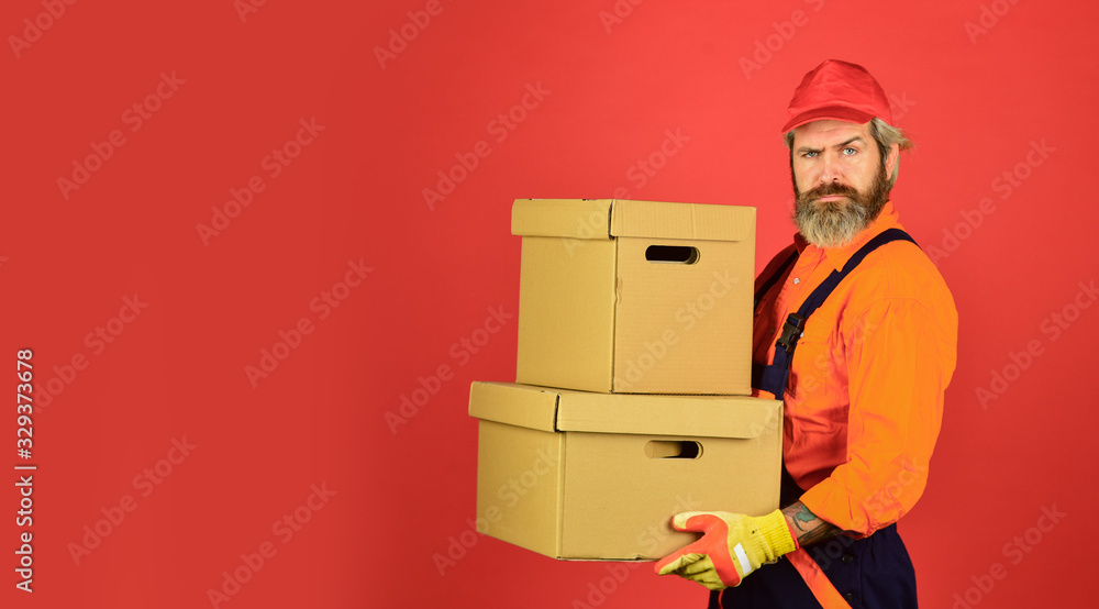 Fast shipping. Post worker. Delivering purchase. Shopping. Bachelor day. Delivered to your destination. Courier and delivery. Postman delivery worker. Handsome man red cap. Service delivery Fast shipping. Post worker. Delivering purchase. Shopping. Bachelor day. Delivered to your destination. Courier and delivery. Postman delivery worker. Handsome man red cap. Service delivery