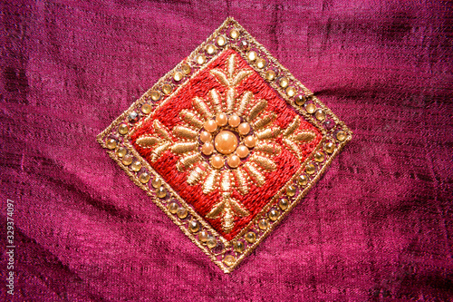 Beautiful Floral Embroidery Design On Light Maroon Color Fabric/Cloth