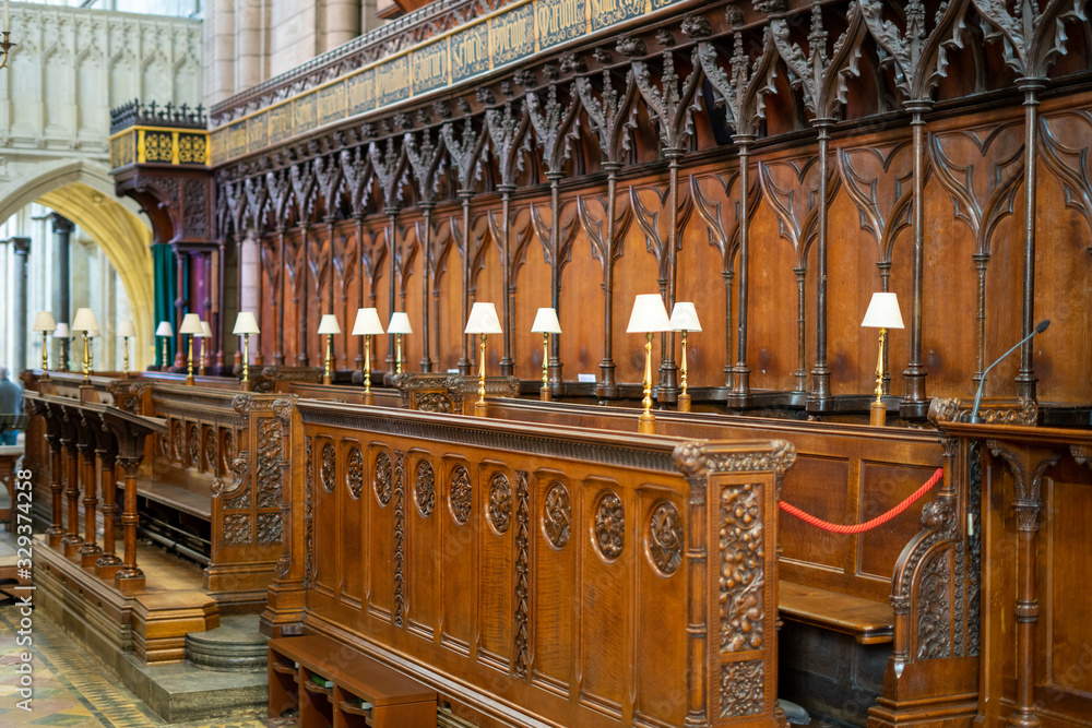 the wooden choir stalls or quire in a cathedral