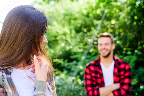 Loving people. happy valentines day. summer camping in forest. family weekend. romantic date. girl in selective focus with man in park. first meet of couple outdoor. Relationship. couple in love