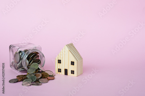 Wooden house model with mon...