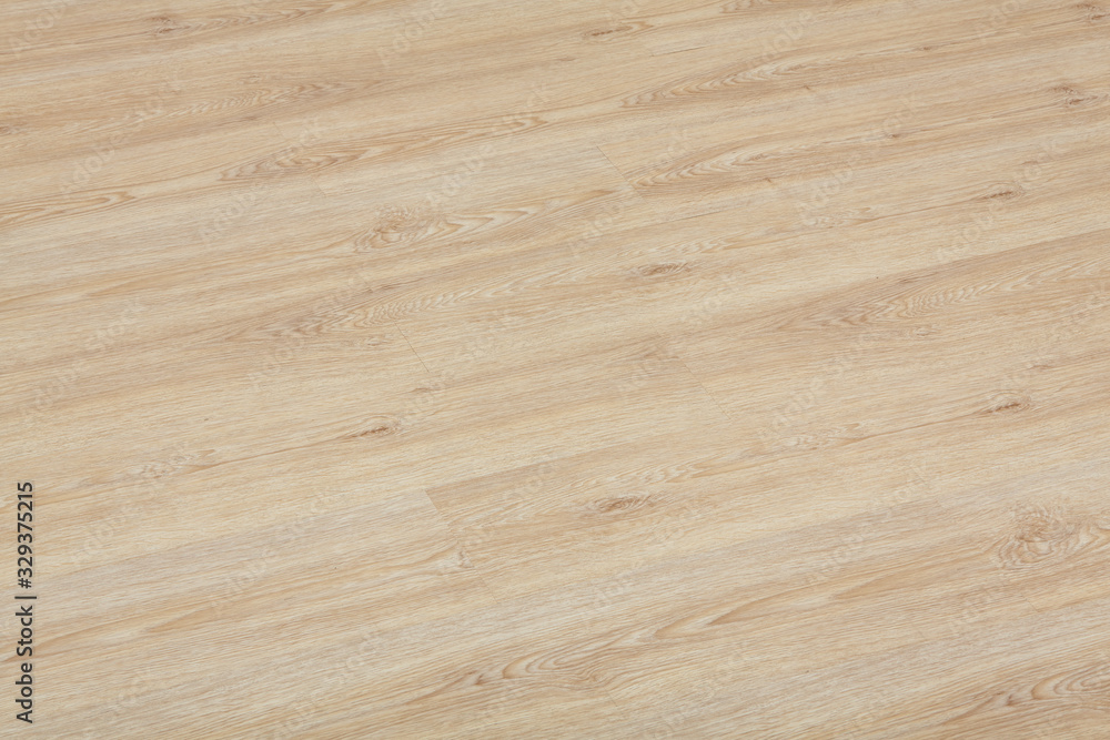 Naklejka premium Wooden natural texture. New parquet blank. Wooden laminate floor boards background image. Home decor.