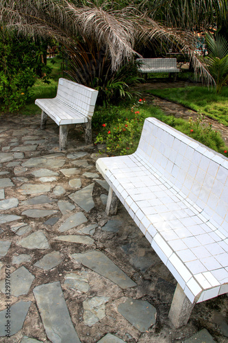 View of white tiled benches at the waterfront in Conakry, Guinea, West Africa
