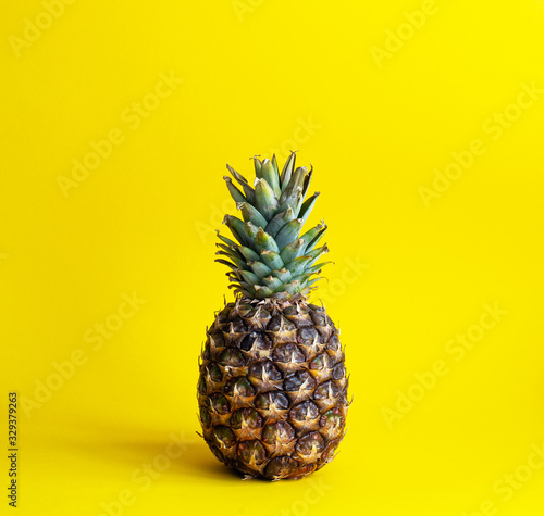 Pineapple on a bright yellow background