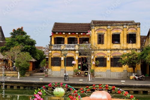 Yellow typical vietnamese house near the river.