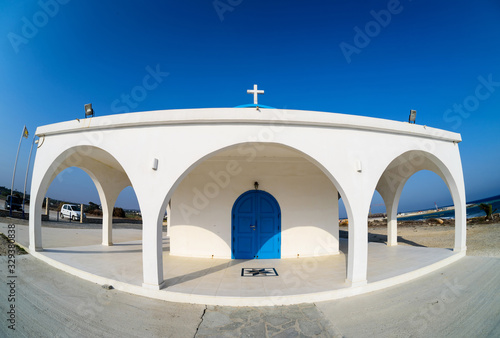 White and blue church, wide angled shot photo