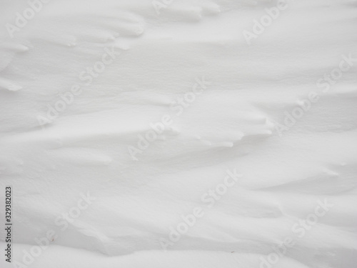 White snow texture of natural snow surface. Nature winter background