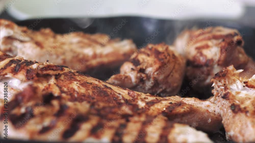 fried chicken breast on the grill. meat is good for muscle growth. proper nutrition for a bodybuilder fried chicken breast on the grill. meat is good for muscle growth. proper nutrition for a bodybuilder