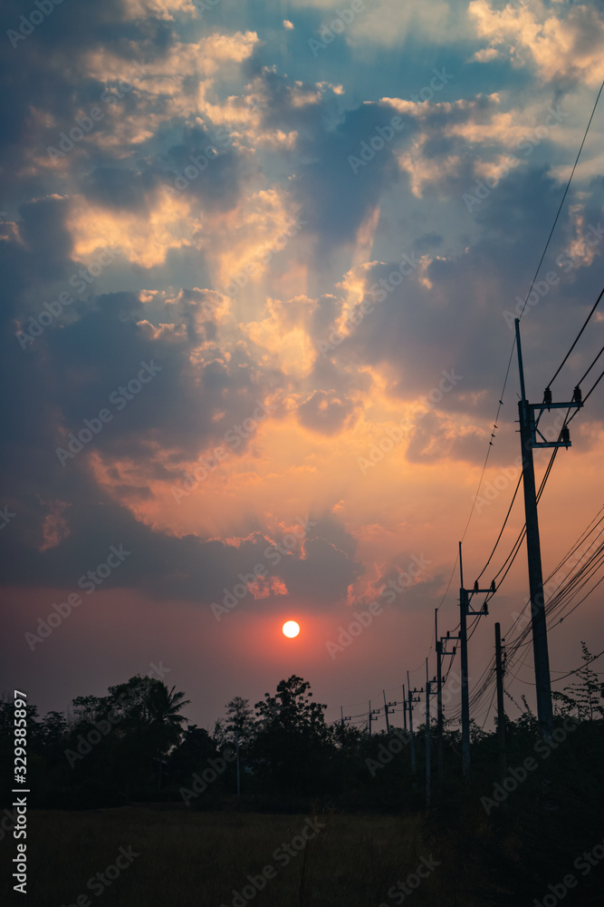 Obraz premium windmill at sunset