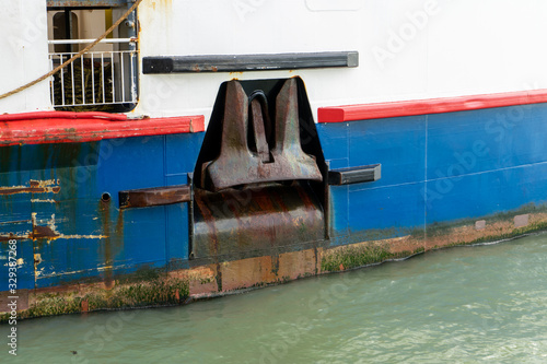 a ships anchor on the side of a ship