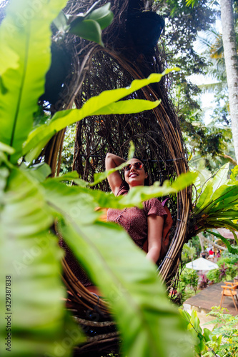 A female tourist is sitting...