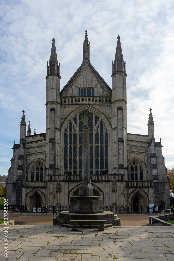 The exterior of Winchester cathedral in Winchester, Hampshire, UK