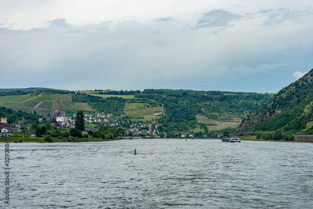 Germany, Rhine Romantic Cruise, a large body of water with a mountain in the background