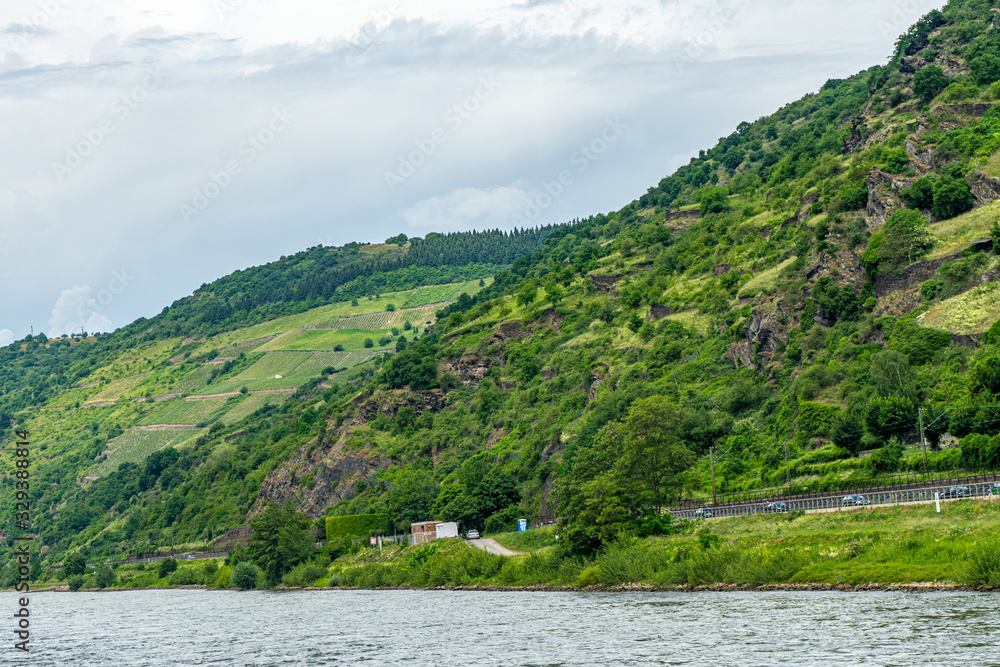 Germany, Rhine Romantic Cruise, a large body of water with a mountain in the background