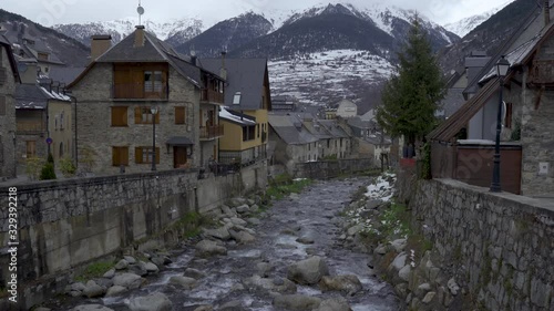 Arriu Nere (Black river) at his pass for Vielha in a spring day. Aran Valley, Lleida, Catalonia, Spain. Winter atmosphere. photo