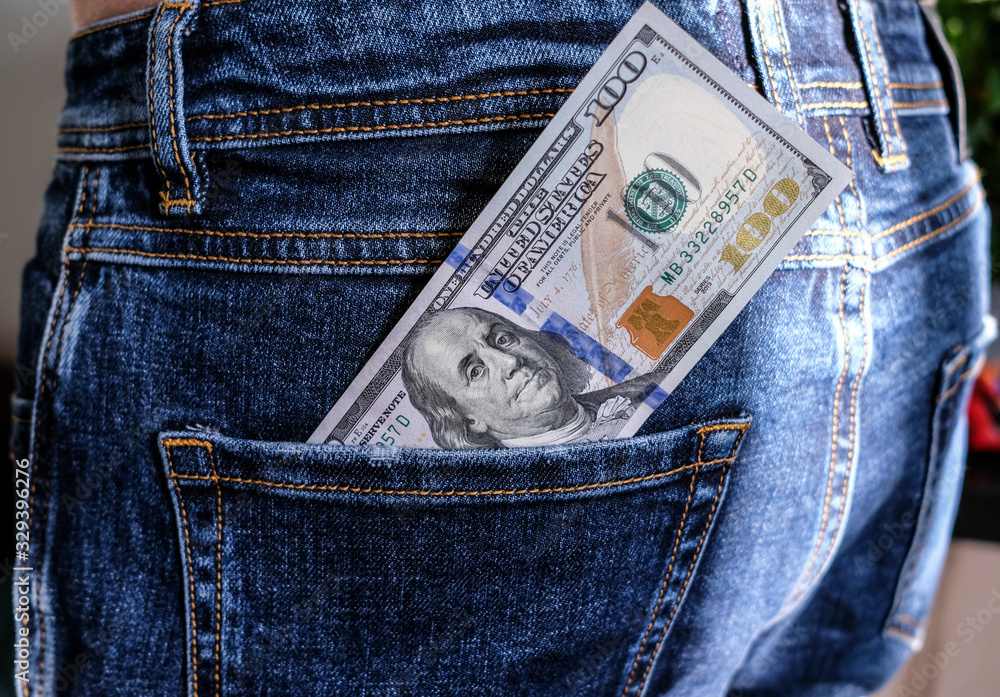 100 dollar bill in jeans pocket 100 dollar bill in jeans pocket