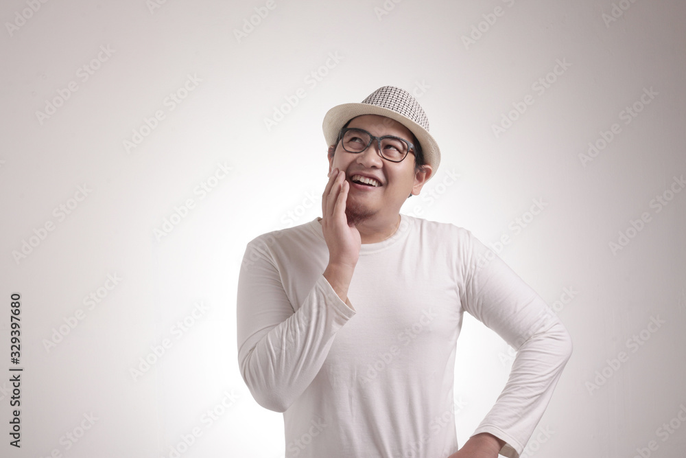 Young Man Thinking and Looking Up, Having Good Idea Young Man Thinking and Looking Up, Having Good Idea