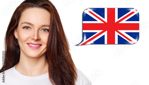 Smiling young woman near dialogue frame with english flag. Speak language concept.