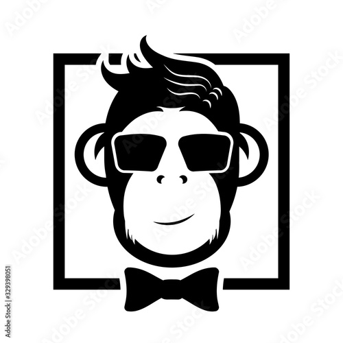 Monkey in a bow-tie. black and white vector image. Logo stylish monkey.