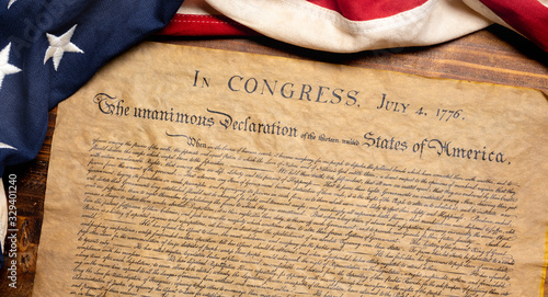 Fényképezés United States Declaration of Independence with a vintage American flag