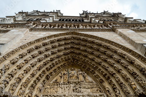 Last Judgement scene at central portal of the Notre-Dame de Paris cathedral west façade, Paris, France