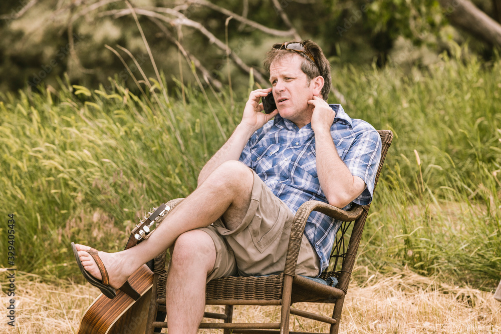 © MACO - Friends and family at a family picnic. Bridger, Montana, USA