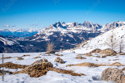 Sunny winter landscape at Ski Area in Dolomites, Italy - Alpe Lusia. Ski resort in val di Fassa near Moena