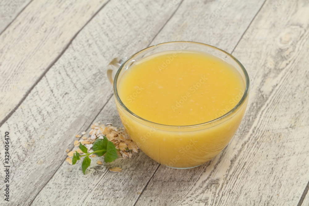 Dietary vegetarian oats milk over wooden Dietary vegetarian oats milk over wooden