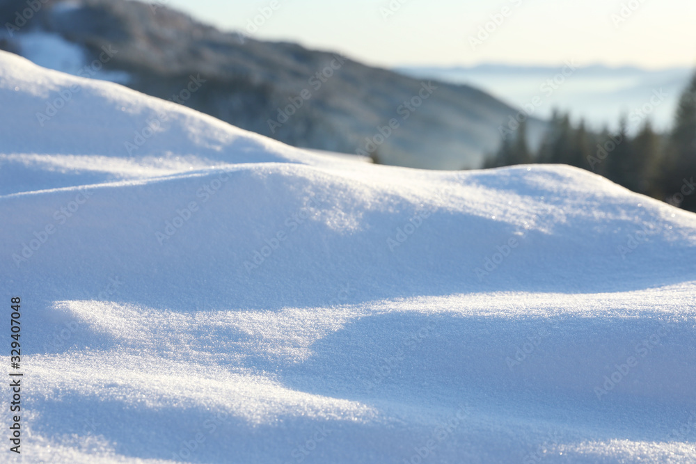 Beautiful snowdrift outdoors, closeup view. Winter weather