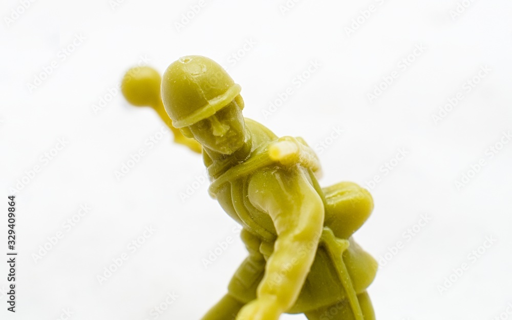 Plastic toy soldier throwing a grenade Plastic toy soldier throwing a grenade