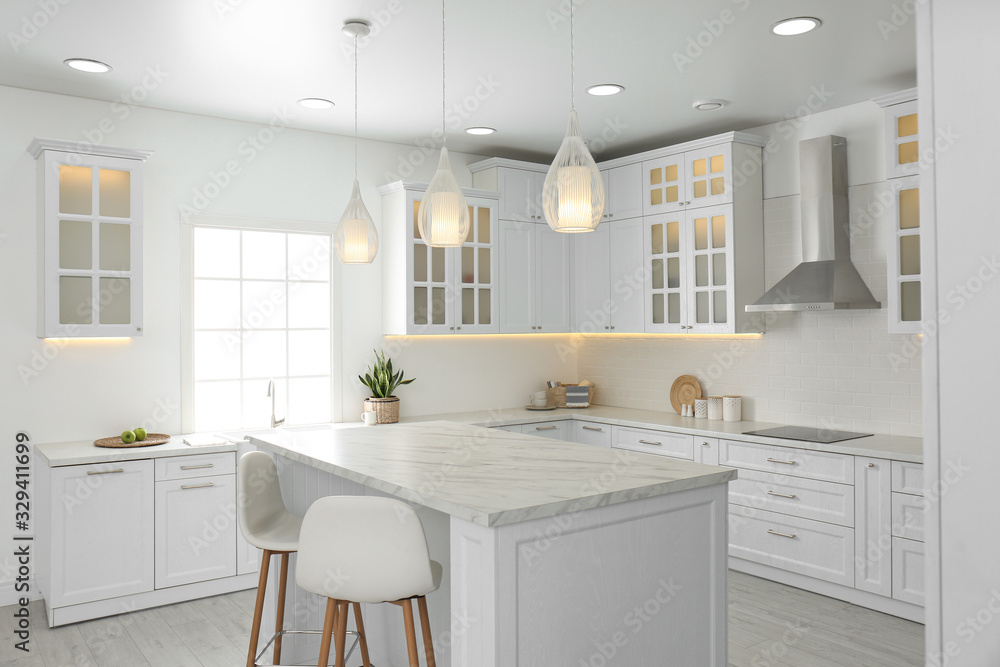 Beautiful kitchen interior with new stylish furniture Beautiful kitchen interior with new stylish furniture