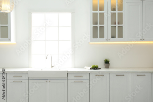 Beautiful kitchen interior with new stylish furniture © New Africa