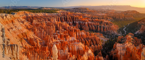 Inspiration Point during beautiful sunrise, with hoodoos - unique rock formations from sandstone made by geological erosion. Bryce National Park, Utah, USA
