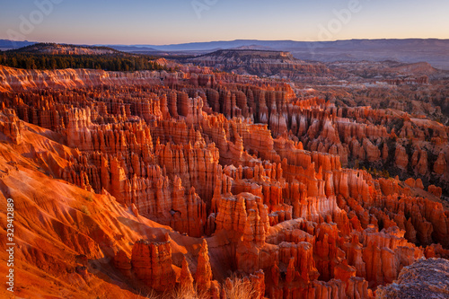 Inspiration Point during beautiful sunrise, with hoodoos - unique rock formations from sandstone made by geological erosion. Bryce National Park, Utah, USA