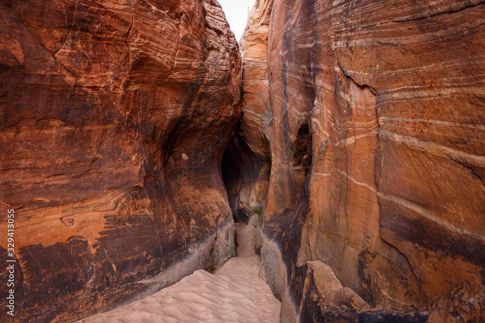 Tunnel Slot during sunny day with blue sky in Escalante National Monument,  Grand Staircase trail, Utah, USA