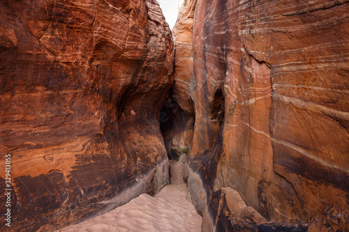 Tunnel Slot during sunny day with blue sky in Escalante National Monument, Grand Staircase trail, Utah, USA