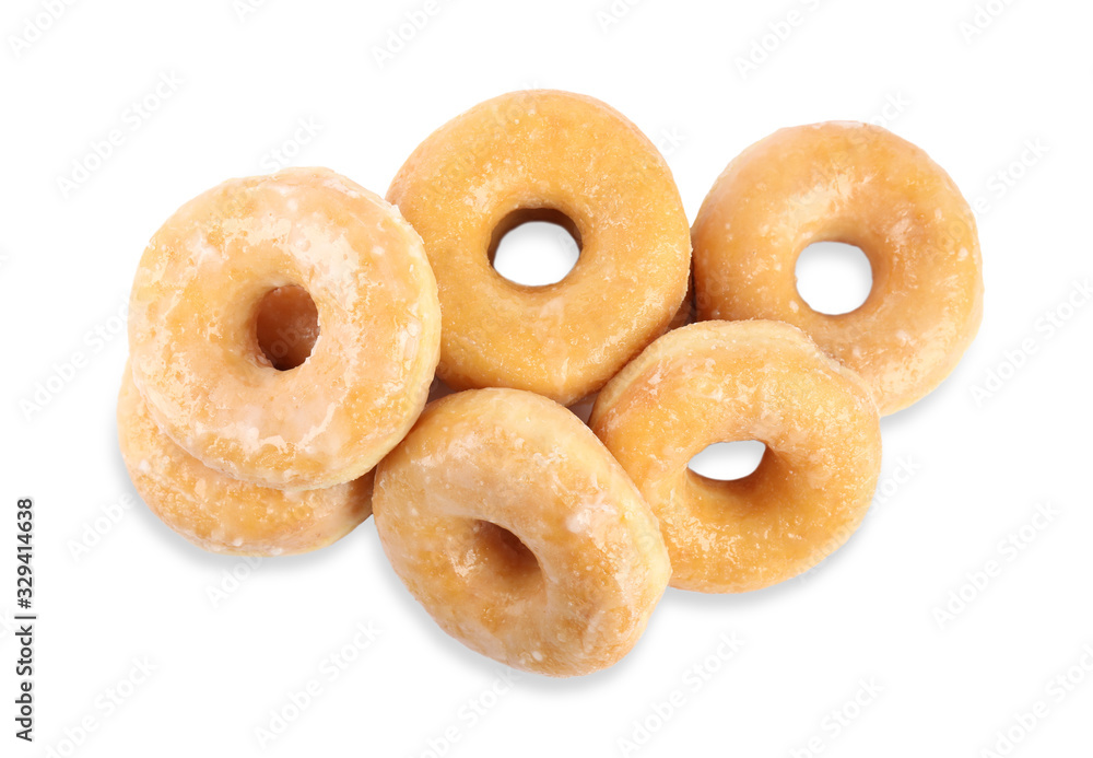 Delicious donuts on white background, top view