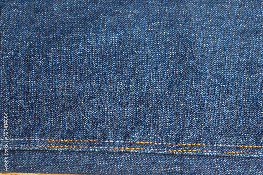 Jeans Background of jeans, denim with trendy seams design. Old grunge vintage texture, sewing technology, cotton fabric, durability Jeans Background of jeans, denim with trendy seams design. Old grunge vintage texture, sewing technology, cotton fabric, durability