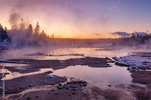 Colorful Norris Geyser Basin area trail during colorful sunset in Yellowstone National Park  Wyoming  USA