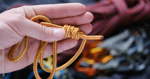 Prusik loop used as autoblock in climbing: close up showing the double fisherman knot. photo