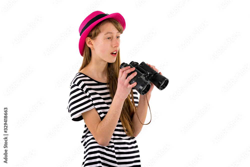 Young brunette girl wering trendy clothes with binoculars on white isolated background.Copy space,mock up banner.Summer concept. Young brunette girl wering trendy clothes with binoculars on white isolated background.Copy space,mock up banner.Summer concept.