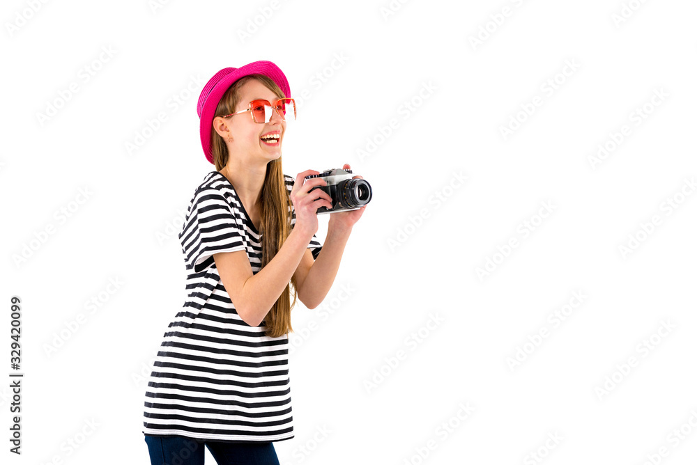 Portrait of smiling girl in striped summer casual clothes,red hat with photo camera isolated on white background. Female passenger traveling abroad to travel on weekends getaway.Journey concept. Portrait of smiling girl in striped summer casual clothes,red hat with photo camera isolated on white background. Female passenger traveling abroad to travel on weekends getaway.Journey concept.