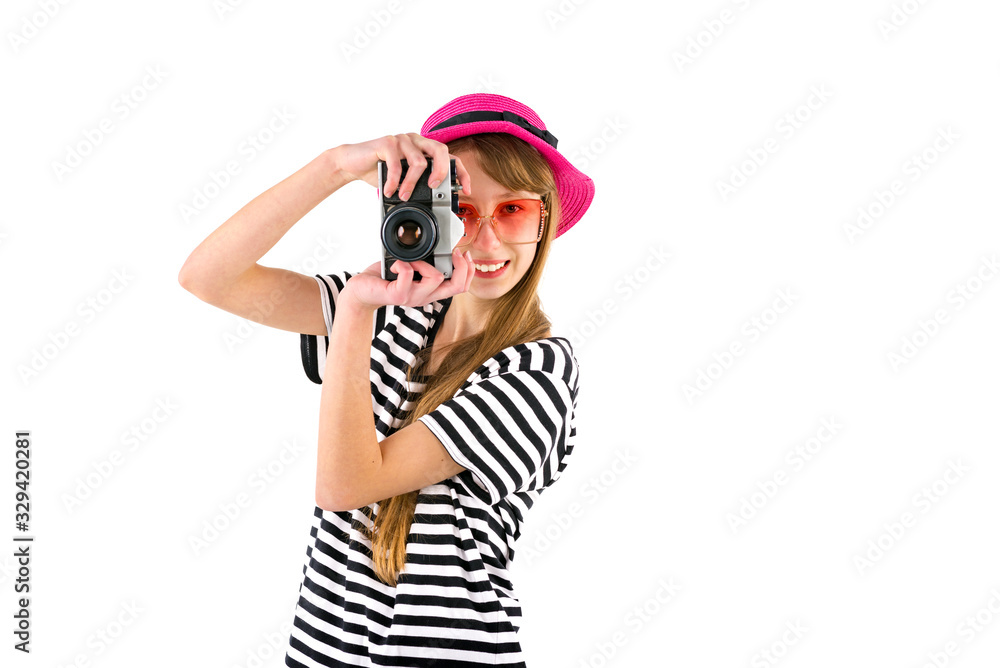 Portrait of smiling girl in striped summer casual clothes,red hat with photo camera isolated on white background. Female passenger traveling abroad to travel on weekends getaway.Journey concept. Portrait of smiling girl in striped summer casual clothes,red hat with photo camera isolated on white background. Female passenger traveling abroad to travel on weekends getaway.Journey concept.