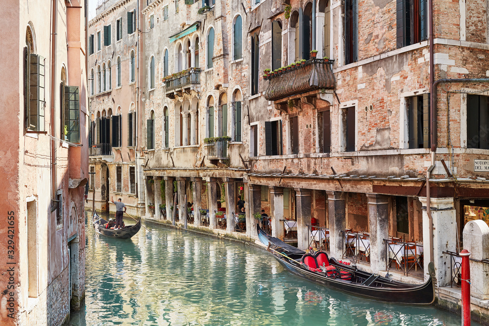 Venice's canals with gondole