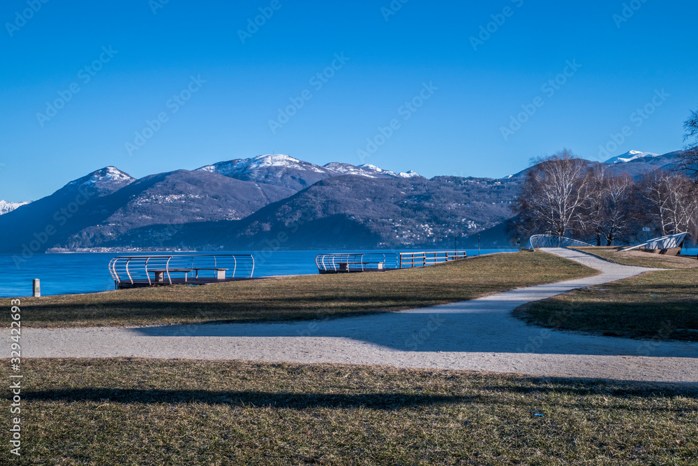 lake maggiore with snowy mountains
